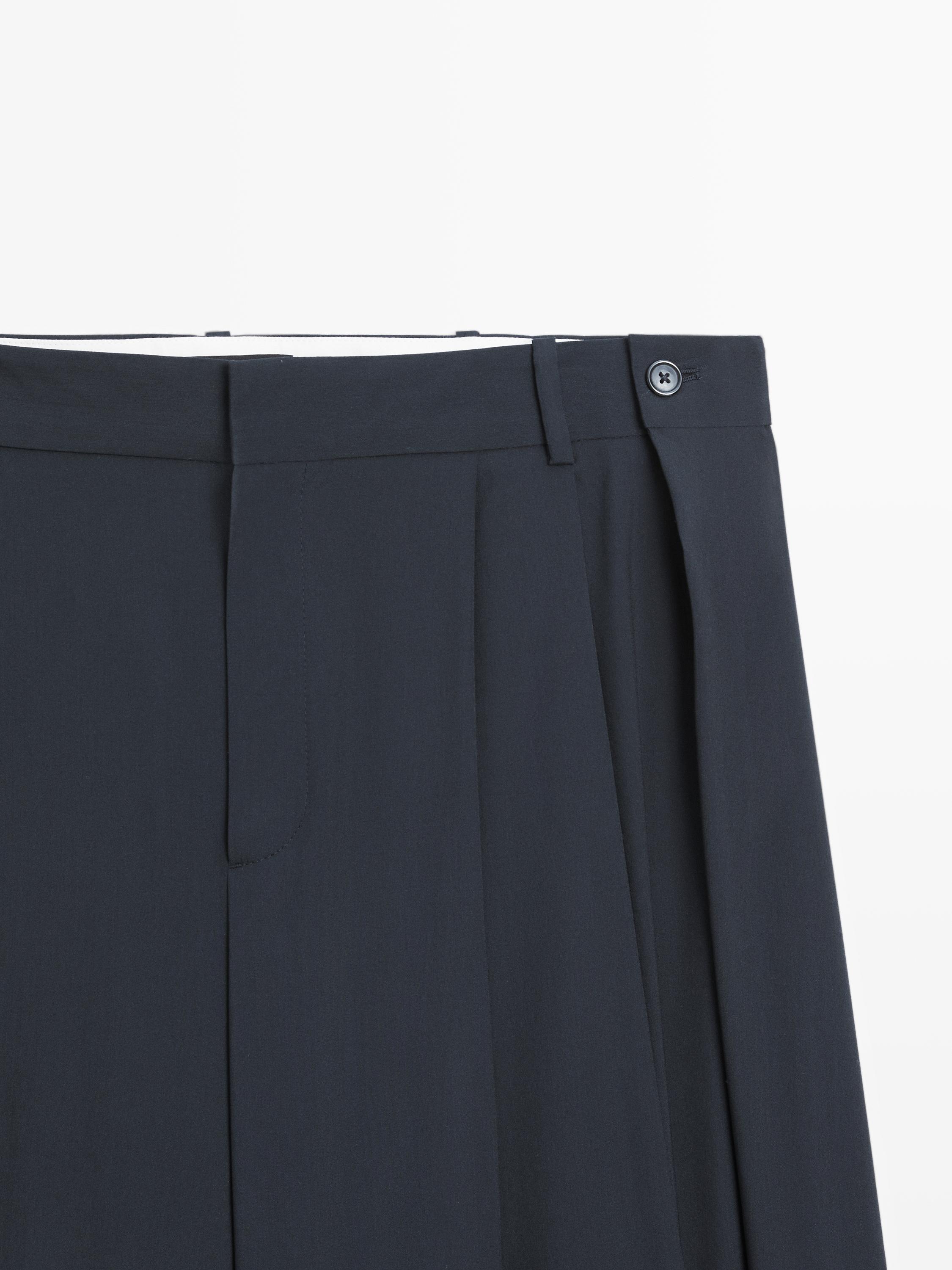 Pleated wool blend trousers